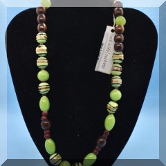 J24. Ceramic and wood beaded necklace 22” - $22 